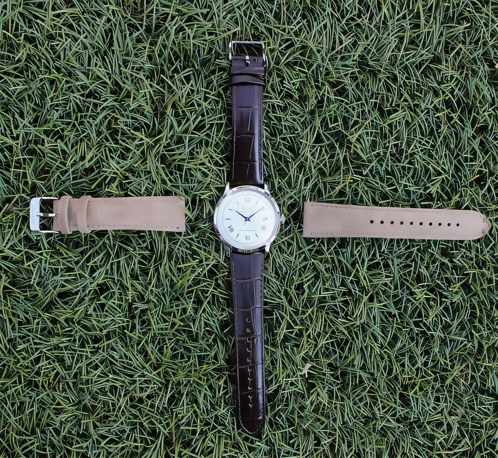 Tan suede and brown croc-embossed straps with quick-release spring bars for the Orient Bambino