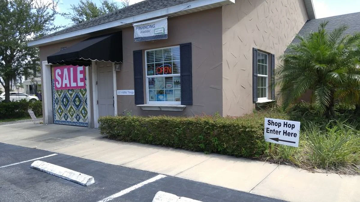 Plain storefront of Sew-Mini Things on County Road 19A