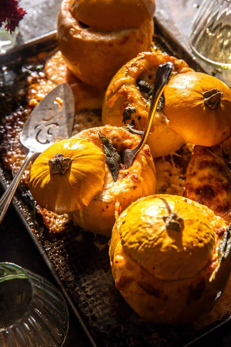 Mini spaghetti squash lasagnas baked on a sheet tray