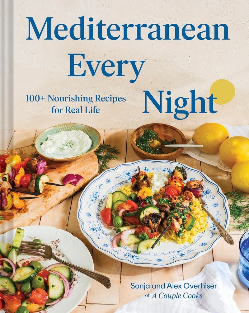Mediterranean cookbook cover showing grilled skewers, salads, and lemons