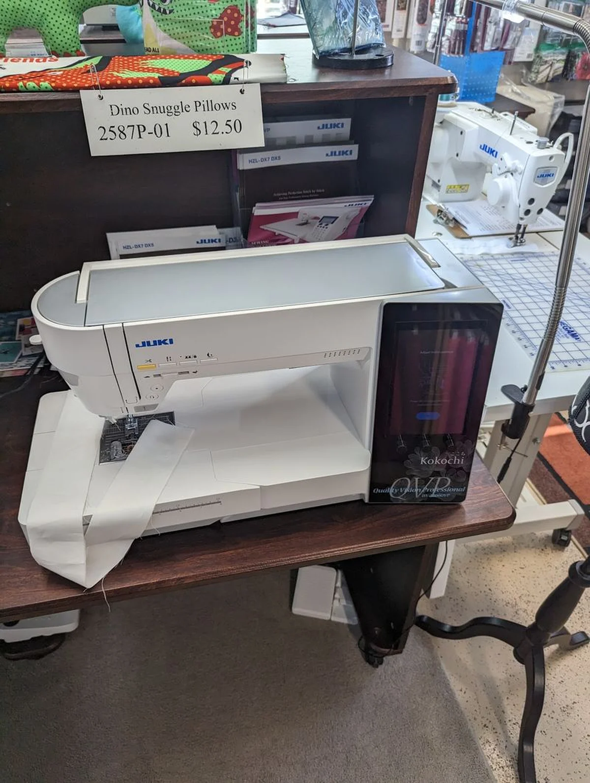 White Juki TL-2010Q sewing machine with foot pedal